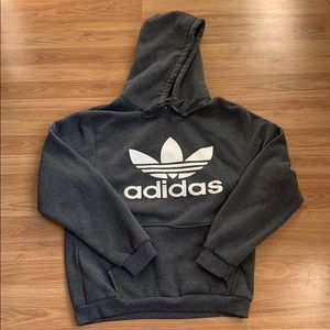 gray adidas hoodie with white design on front